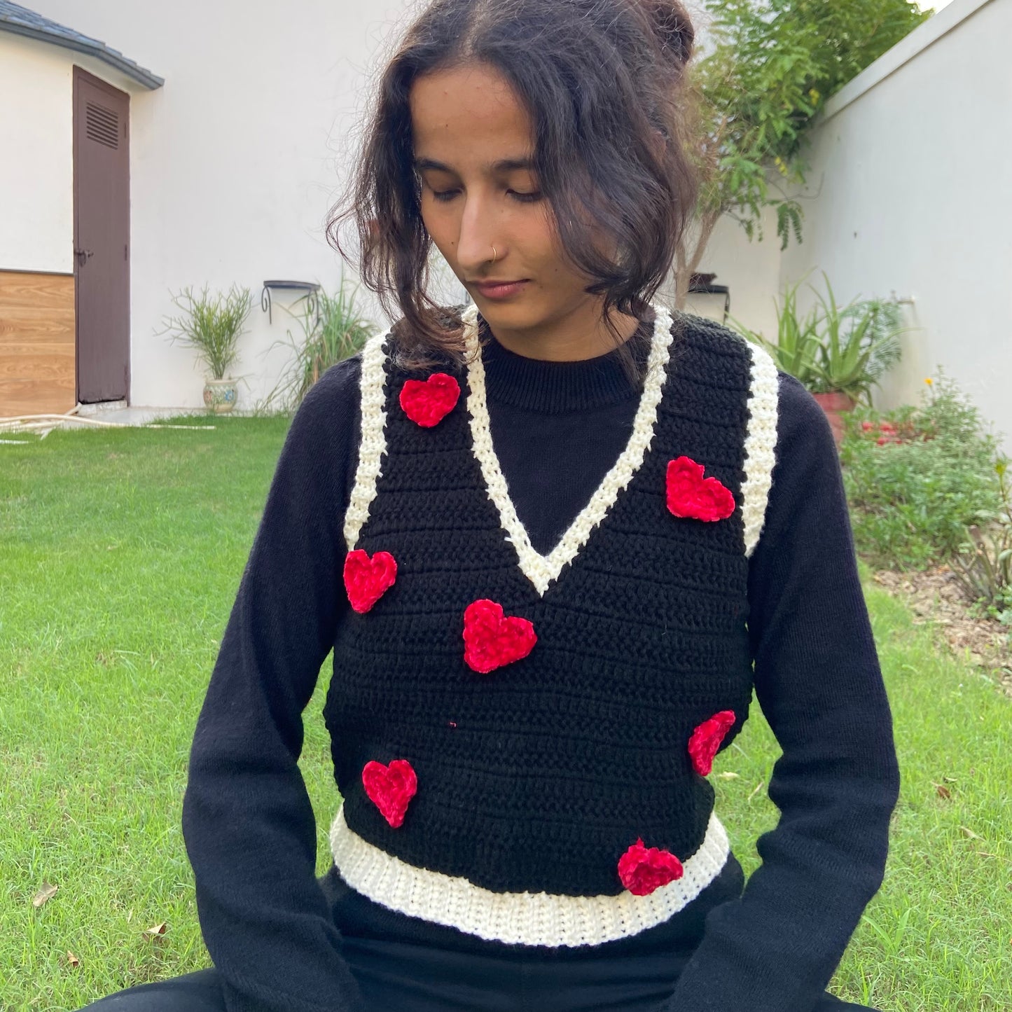 Black vest with velvet heart